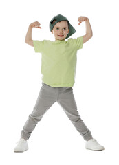 Happy little boy in baseball hat dancing on white background