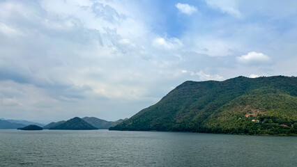 Scenic Summer Landscape of Kaeng Krachan Dam with Mountains and Lake under Blue Sky, Phetchaburi, Thailand