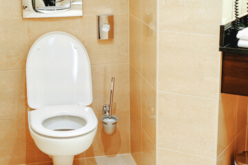 Tiled bathroom with floating wall-hung toilet design