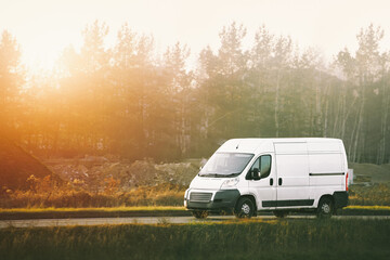 Commercial transportation van driving on highway © AlexGo