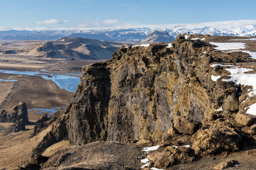 Black sand and  oceanic water on Reynisfjara beach, Iceland views from the Dyrholaey lighthouse and viewpoint on a sunny morning