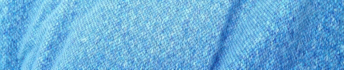 Crisp, slightly textured light blue denim, showing distinct vertical and horizontal lines , fabric, macro shot, clean