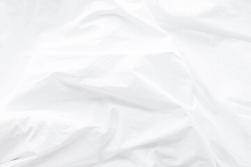 White bedsheet bedding crisp clean soft white bedsheet smooth texture creates a minimal airy background perfect textile detail fresh hygienic cozy domestic feel gentle plush comfort cotton fabric.
