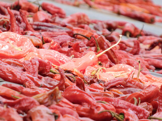 red chili peppers on the roof for drying