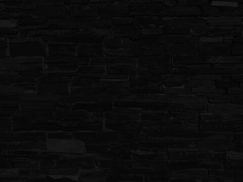 Chic Black Stone Wall: Seamless and Textured Slate Bricks for a Modern Design