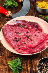 Raw cuts of meat, beef.