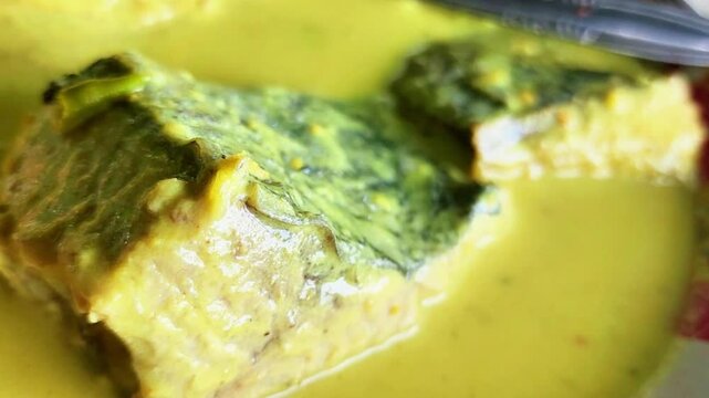 Coral fish curry with yellow sauce from Pariaman Padang, West Sumatra
