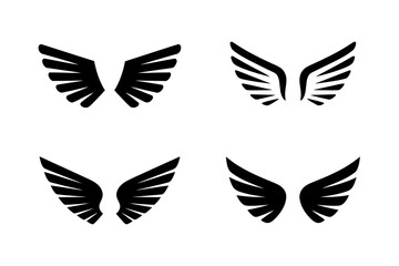 Four sets of stylized black wings on white background