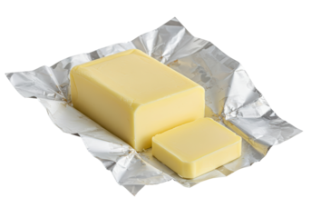 Isolated Fresh Butter Block in Silver Foil Wrapper