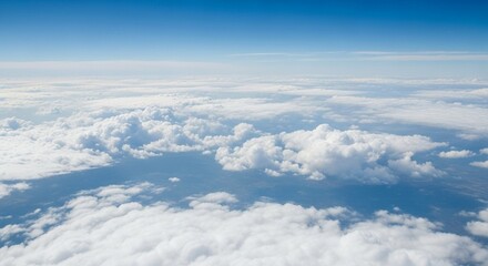 Naklejka premium Stunning Aerial View of Cloudscape A Breathtaking Panorama of White Clouds and Blue Sky