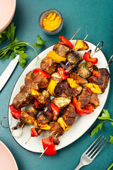 BBQ meat on skewers, food photography.