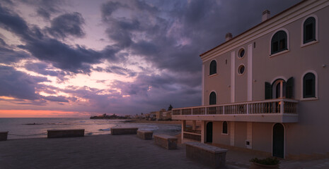 Captivating Twilight Hues Over Punta Secca Warm the Sicilian Coast at Dusk, Italy