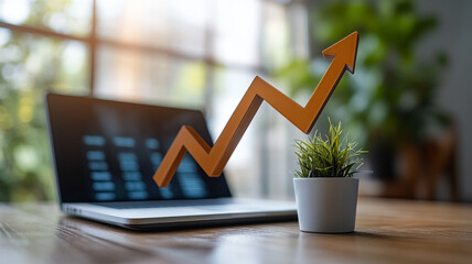 Arrow pointing upward over laptop with plant, symbolizing business growth.