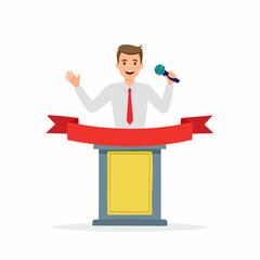 a man is singing on a podium wearing a ribbon