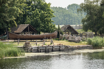 reconstruction of an old settlement, wooden cottages, open air museum, medieval, historic