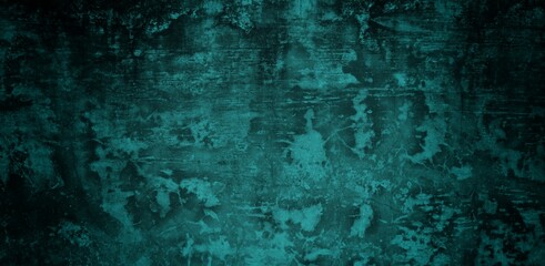A textured background featuring a deep teal color with a distressed, grunge appearance. The surface shows variations in tone and subtle patterns, creating an abstract and moody aesthetic.