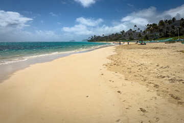 Scenic view of famous Lanikai Beach in Kailua on the island of Oahu, Hawaii, USA against blue sky with clouds