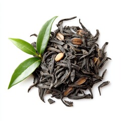 Pile of black tea leaves mixed with seeds and fresh leaves on white surface.