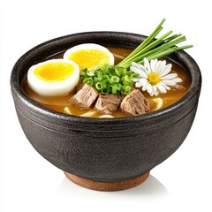Close up of a delicious ramen bowl with meat, egg, flower and scallions.