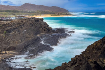 Long exposure scenic view of Halona Cove along Kalanianaole Highway 72 with Blowhole Lookout, Oahu, Hawaii, USA