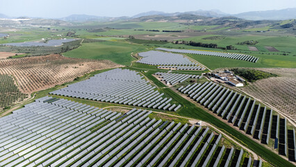 Solar panels generating clean energy in vast agricultural landscape