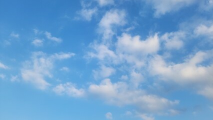 White cloud on blue sky background panorama, bright sunny day on summer winter season day. Light spring bright gradient abstract on cyan blue color. Nature view background
