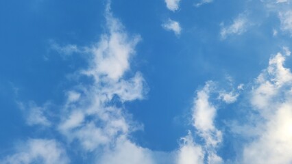 White cloud on blue sky background panorama, bright sunny day on summer winter season day. Light spring bright gradient abstract on cyan blue color. Nature view background