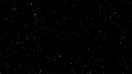 Real snowfall out of focus on black background for overlay blending mode. Flying dust particles on a black background