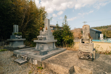Scenery of visiting a Japanese grave.