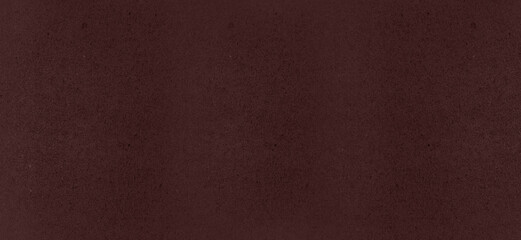 Fototapeta premium Abstract dark brown chocolate background with scuffs and dots. Texture of wall, paper, wallpaper for design, layout. Rough empty vintage brown backdrop