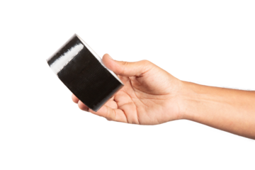 Male hand holding black duck tape isolated no background cutout
