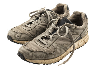 Worn athletic shoes with frayed edges and faded color, perfect for casual or vintage style