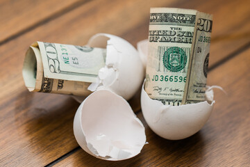 broken eggshells with money in it to show how expensive the eggs got this year
