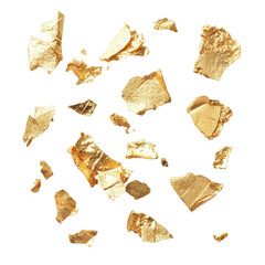 Shimmering gold flakes scattered on a white background for decorative art and craft projects