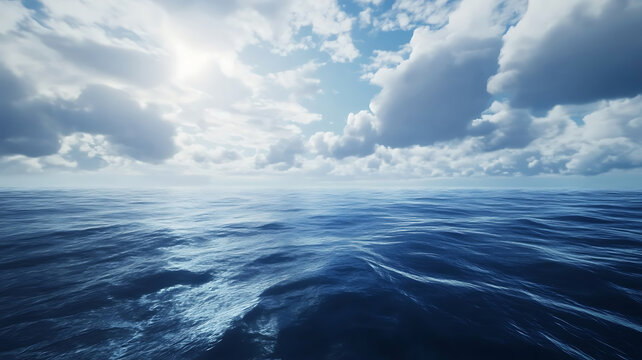 Tranquil ocean under a dramatic cloudy sky showing serene open waters and bright sunlight