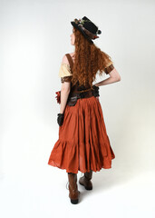 Full length walking portrait Steampunk Botanist, mad scientist, female model in Victorian Costume...