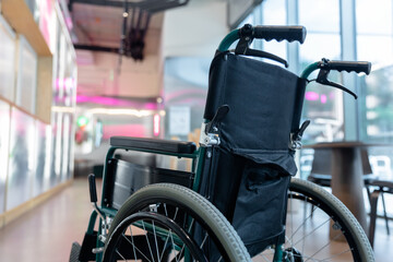 Picture of a wheelchair in the middle of the room