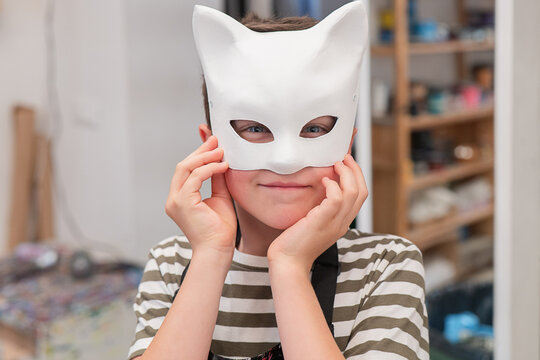 Child in Venice mask workshop with creative expression