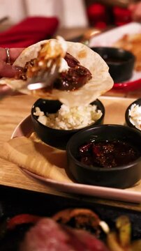 Preparing Tlayudas in a Mexican Restaurant Setting