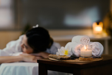 Relaxed lady at spa with focus on spa equipment. Wellness concept