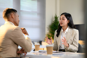 Two colleague discussion on office workplace