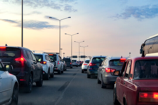 Background, blur, out of focus, bokeh. The evening traffic jam on busy roads causes significant delays for commuters at rush hour - Powered by Adobe