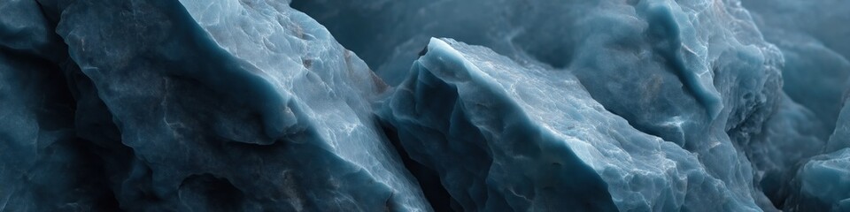Close-up view of jagged ice formation with textured blue surface