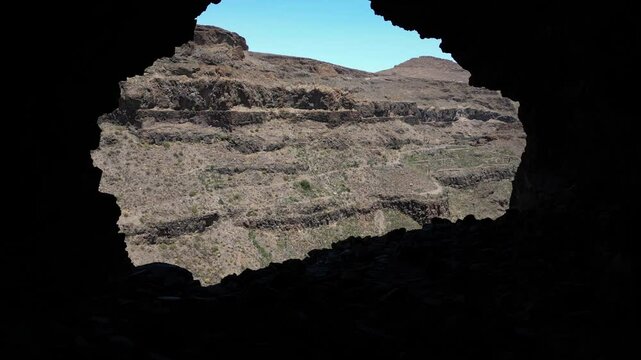 Exploring the Ansite Fortress Cave on the island of Gran Canaria, producing a magical effect.