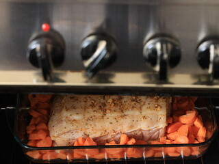 pork roast in glass tray oven cooked