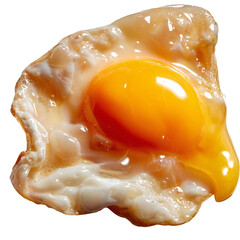 A close up shot of a fried egg with a bright yellow yolk against a dark background on its own isolated white background