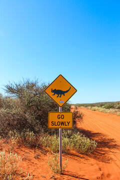 Thorny devil road sign on red dirt road