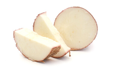 Cut cassava root on a white background