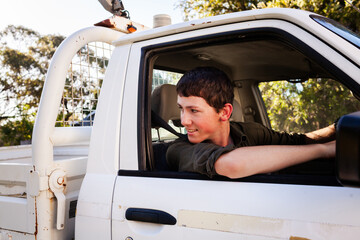 Young P plater provisional driver backing ute on farm in country