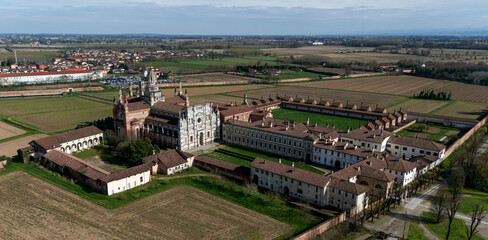 Aerial view of the Certosa di Pavia, built in the late fourteenth century, courts and the cloister of the monastery and shrine in the province of Pavia, Lombardia, Italy